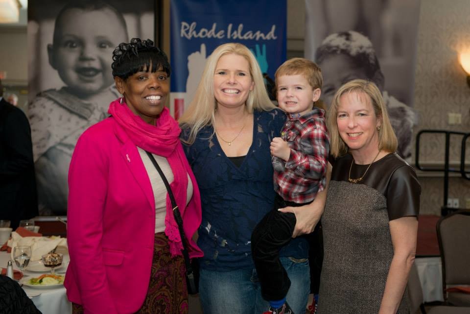 From left: Jackie Dowdy, from Neighborhood Health Plan of Rhode Island, Serena Simeone and her son, Braden, and Elizabeth Burke Bryant, executive director of Rhode Island Kids Count, at the 20th annual Celebration of Children's Health.

© 2014 Peter Goldberg