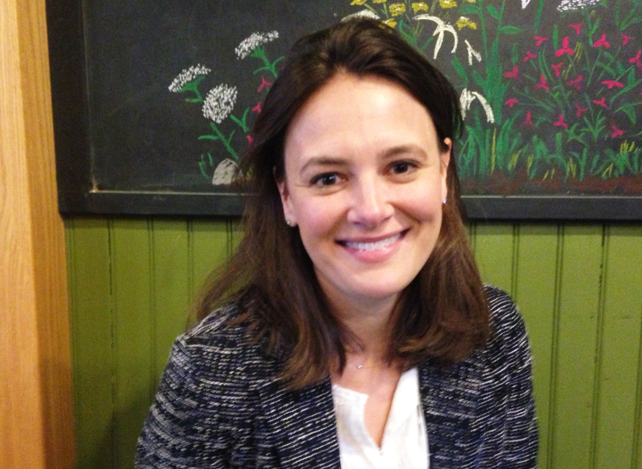 Rachel Flum, executive director of the Economic Policy Institute, interviewed by ConvergenceRI at Olga's Cup and Saucer, talking about the state budget.