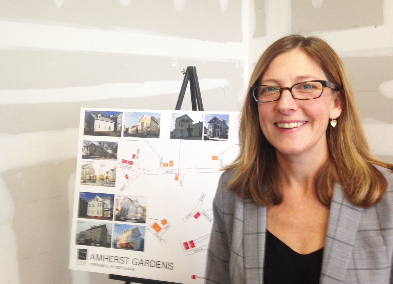 Jennifer Hawkins, the executive director of ONE Neighborhood Builders, at a recent event celebrating the completion of the Amherst Gardens project.