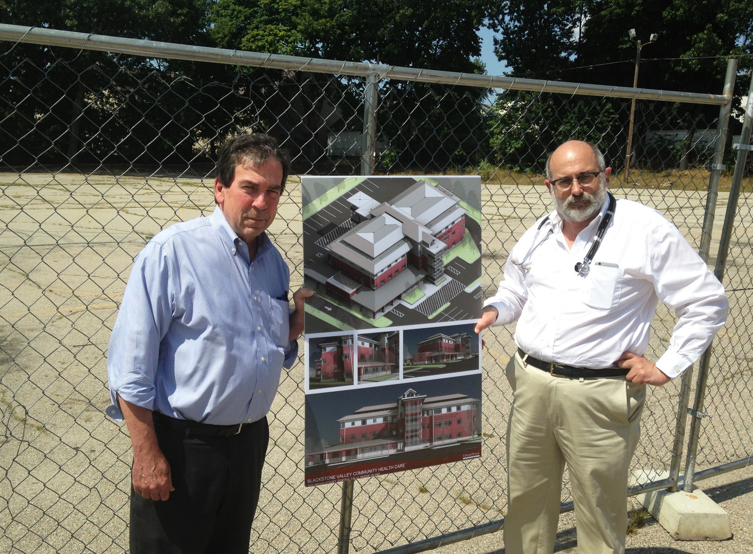Ray Lavoie, left, the executive director of Blackstone Valley Community Health Care, and Dr. Michael Fine, senior clinical and population health officer at Blackstone Valley, at the site of the Neighborhood Health Station in Central Falls. Construction is almost completed now, with an opening scheduled for this fall.