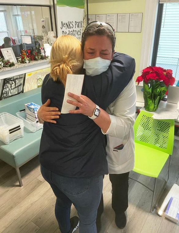Central Falls Mayor Maria Rivera hugging Dr. Beata Nelken on Thursday, Dec. 29, posted by the Mayor in a tweet that said: "The highlight of my day. It's been a day, but Dr. Nelken made it all worth it. She's definitely our community hero."