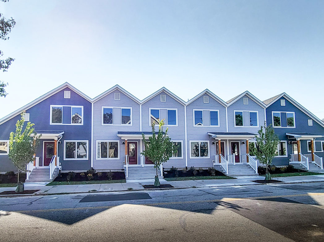 Residents have started moving into the Bowdoin Street Rowhouse, ONE|Neighborhood Builder's newly completed multifamily rental development in Olneyville, a modular construction project. Two of the apartments will provide housing for individuals who had been homeless.

B