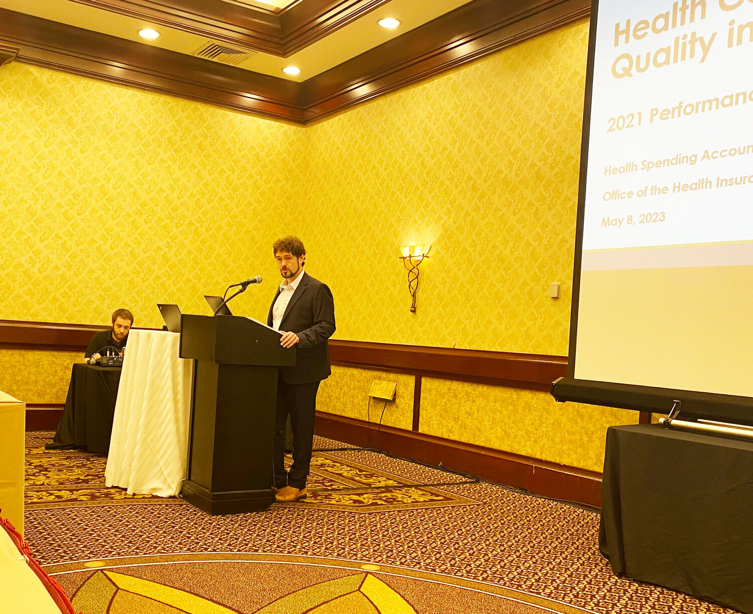 Cory King, Acting R.I. Health Insurance Commissioner, speaking at the public forum on Health Care Spending Trends in Rhode Island, held on Monday, May 8.